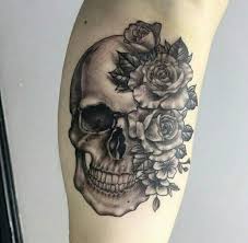 Skull With Roses Tattoo Feminine Skull Tattoos Skull Tattoo Design Skull Rose Tattoos
