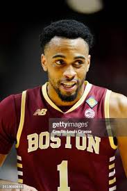 Keylan Boone of the UNLV Rebels and Fred Payne of the Boston College...  News Photo