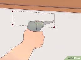 Why you should get an electrician to install your extractor fan. How To Fit A Cooker Hood With Pictures Wikihow