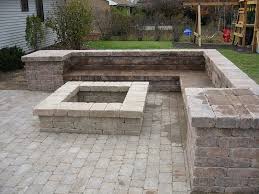 If you will be using adhesive on your firepit you may add it to the top of the first course of block. Patio Built In Seating Fire Pit Backyard Fire Pit Patio Patio With Fire Pit