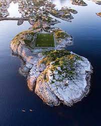 Football / soccer pitch for the community of henningsvar in lofoten islands, norway. The Tiny Norwegian Football Stadium Known As Henningsvaer Idrettslag Stadion From The Small Fishing Village Of Henningsvaer In Lofoten Nordland Northern Norway Norway Norway Places To Visit Lofoten