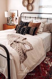 A bright and happy room with white and bit of black tones in form of bed covering outline and plant containers. Bohemian Bedroom Decor You Ll Want To Copy Bohemian Bedroom Decor Apartment Decor Boho Bedroom Decor