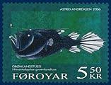 Originating above or slightly in advance of the small eye is an illicium (the fishing rod) and at its end a bioluminescent, bulbous esca (the fishing lure, its light owing to symbiotic bacteria). Footballfish Wikipedia