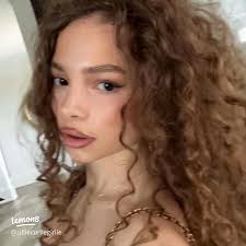 Explore Eliana's Unique Style and Engaging Social Media Presence