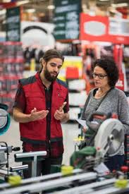 You can use one to share a file quickly, store something. Salesman And Female Customer Using Smart Phone In Hardware Store Masf02173 Maskot Westend61