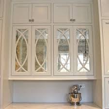 If you have a small or dark kitchen, use a mirror backsplash to look bigger and brighter. Mirror Kitchen Cabinet Houzz