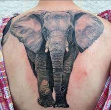 Elephant with colorful butterfly tattoo design for the back. 50 Geometric Elephant Tattoos Designs Ideas 2021 With Meaning