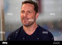 HOLD FOR MOVEMENT WITH STORY BY WILL GRAVES—Gymnastics coach Laurent Landi  talks about coaching reigning Olympic champion gymnast Simone Biles  Tuesday, May 11, 2021, in Spring, Texas. (AP Photo/David J. Phillip Stock