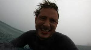 Bodyboarding in torrential rain