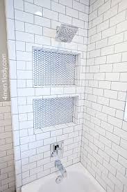 Check spelling or type a new query. Making Over Our Bathroom With Peel Stick Wallpaper Penny Round Tile Bathroom Penny Tiles Bathroom Tile Shower Niche