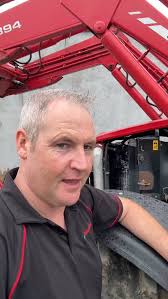 So this is Dean from TankFab (the guy that built our diesel storage tank)  stacking his bales with soft hands