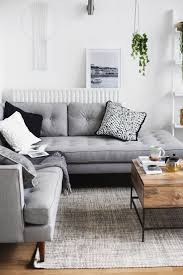 Warm or crisp, bold or beachy, nice in a traditional setting or a contemporary one, this colour perfectly adapts to its environment. Living Room Layout And Decor Rooms In Grey Couch Decorating Ideas Layjao