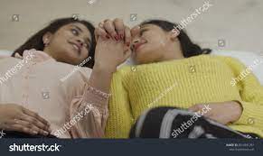 Indian Lesbian Couple Lying On Bed Stock Photo 2010291251 | Shutterstock