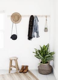 You can also put picture frames or other small items around to give it a more personalized look. Diy Wooden Wall Mount Rack The Merrythought
