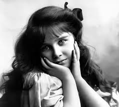 Pretty Elizabeth Bowes-Lyon at the age of seven in Edwardian fashion style  (1907)