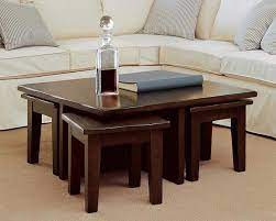 A coffee table with stools will add extra seating to your living area and look great at the same time! Coffee Table With 4 Stools Coffee Table Design Ideas Coffee Table With Stools Coffee Table Coffee Table With Stools Underneath