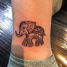 21 Cool And Creative Elephant Tattoo Ideas 21 Small And Cute Elephant Tattoo Elephanttattoo T Elephant Tattoo Small Cute Elephant Tattoo Elephant Tattoo