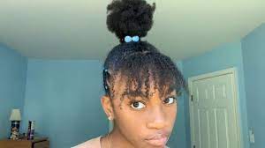 Tomi On Instagram Top Knot With Bangs And Rubber Bands My Hair Was Blow Dried Detangled Be Short Hair Top Knot Top Knot With Bangs Hairdo For Long Hair