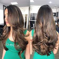 This red toned chestnut style sports sweeping bangs, thick upper layers and wispy lower ones. 80 Cute Layered Hairstyles And Cuts For Long Hair In 2021