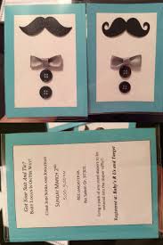 Baby shower invitations for a boy were customized with the yellow and gray argyle pattern with a yellow and white seersucker striped onesie. Diy Mustache And Bow Tie Baby Shower Invitations Keeping It Classy A Mustache Baby Shower Invitations Mustache Baby Shower Bow Tie Baby Shower Invitations