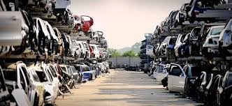 Most car junk yards near me have their cars arranged in rows and piled on top of each other. West Third Auto Parts Cyrus Auto We Buy Junk Scrap Car