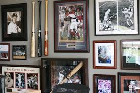 A wide variety of sports wall decor options are available to you, such as metal, wood and glass.you can also choose from restaurants, caterers & canteens and super markets sports wall decor,as well as from. Sports Themed Gallery Wall Like This For The Basement Sports Themed Room Sports Gallery Wall Sports Memorabilia Room