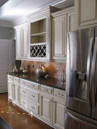 Consider painting your kitchen cabinets cream if you're working with a small kitchen; Posts About Cream With Chocolate Glaze Cabinets On Off White Cabinets Off White Kitchen Cabinets Off White Kitchens