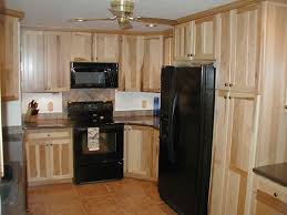 Hickory Cabinets And Black Appliances Country Kitchen Kitchen Remodel Hickory Cabinets