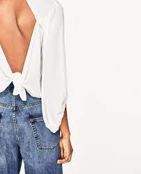 Blouse adaptée, dos extensible, col rond, poche à l'avant, manches courtes, ouverture complète au dos, fermeture à. Image 3 Of Blouse With Open Back From Zara Tops Fashion Womens Tops