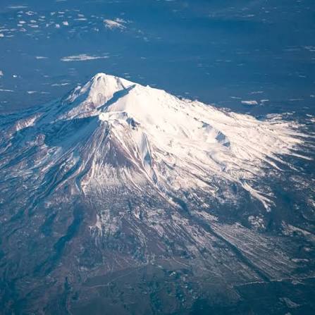 View of Mt. Shasta from airplane window flying into Medford, Oregon