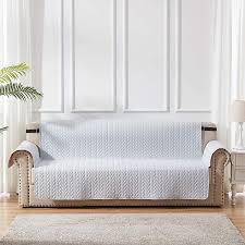 See this beige patterned sofa with brown and green accent pillows in this neutral living room at hgtv.com. Amazon Com Furniture Protector Sofa Covers 100 Waterproof Leaf Pattern Quilted Couch Slipcover With Adjustable Elastic Strap And Non Slip Backing Light Grey Beige Kitchen Dining