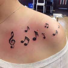 Note tattoo on the foot: 82 Creative Music Tattoos For The Music Lover In You Music Tattoos Small Shoulder Tattoos Small Music Tattoos