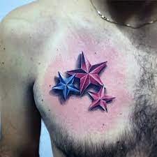 The red star and the lifetime lettering hold special meaning for the man and that is why he got them carved on. 40 Simple Star Tattoos For Men Luminous Ink Design Ideas