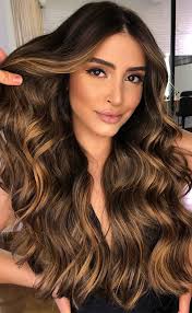 Caramel brown hair features all the same attributes, but those golden highlights are blended with a brown base to create a rich look. 57 Cute Autumn Hair Colours And Hairstyles Golden Caramel Highlights