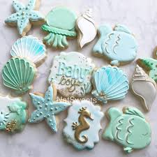 We offer perfectly matching, themed baby shower supplies and baby shower decorations, novelty baby shower favors to complement the theme, and plenty of keepsakes, balloons, and candy favors to celebrate any sort of baby shower, traditional or otherwise. Under The Sea Baby Shower Baby Shower Cookies Custom Cookies Baby Shower Decorations For Boys