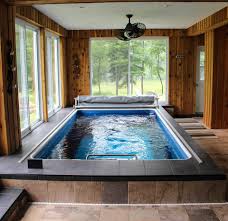 An Indoor Endless Pool Can Easily Be Used Year Round Piscines Interieur Piscine Interieure Piscine