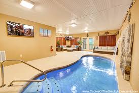 Entry level of this cabin features the living, kitchen, and dining area, 2 bedrooms. Gatlinburg Cabins With Indoor Private Pools