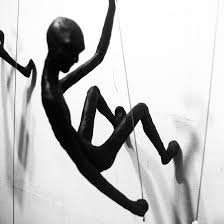 These climbing man wall sculpture are durable and trendy. Climbing Man Wall Sculpture For Sale Black Or Gold Resin Or Brass