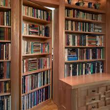 This traditional bookcase/wall unit was custom made for this space, with floor to ceiling storage. Custom Built In Bookcases Houzz
