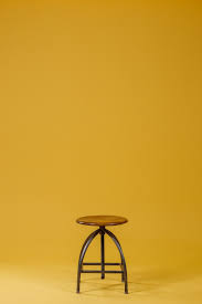 Round Brown Wooden Top And Black Base Chair On Yellow Background Photo Free Furniture Image Light Background Images New Background Images Picsart Background Free online background remover to remove the background from any image or photo. light background images