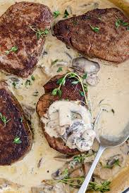 Medallions of beef tenderloin are covered with a creamy porcini mushroom sauce and surrounded by new potatoes then roasted to savory perfection. Beef Tenderloin With Truffled Mushroom Sauce Simply Delicious