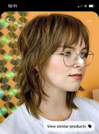 Who can do a decent haircut in Sheridan, WY?