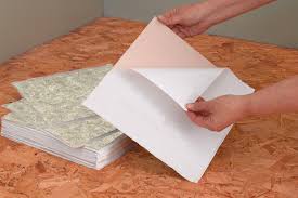 How to tile concrete floors with self adhesive vinyl tiles. Vinyl Tile Installation
