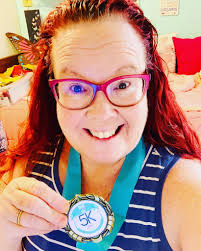 One More Mile 5k medal to the world