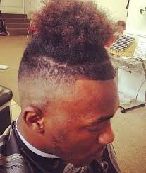 Man Bun Temple Fade Hairstyle Photograph Mens Haircuts Fade Fade Haircut Best Fade Haircuts