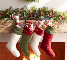 They're angled to hang from a mantelpiece, shelf, or ledge. Bronze Alphabet Stocking Holders Pottery Barn