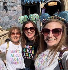 Harriet's daughter Pam & granddaughters Chelsea & Haley proudly posing  under Harriet's recently refurbished window at Disneyland thia week and  also proudly showing off the shirts featuring Harriet along with her OG