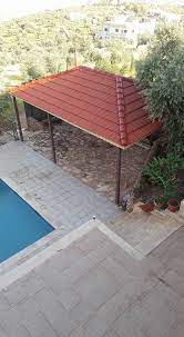 تركيب أسقف قرميد عرائش بامبو أفريقي مشبات حجر رخام طوب جص شوايات أفران حفرمندي شلالات ترميم حجر واجهات house paint exterior outdoor decor house painting