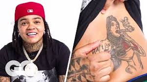 It is the one you are looking for tangled and honest arrow tattoo design. Watch Young M A Decodes The Truth Meaning Behind Her Body Tattoos This One Is A Girl Pulling A Gun Sohh Com