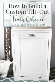 Springs on the hinges keep it closed. How To Build A Custom Tilt Out Trash Cabinet Abby Lawson